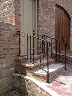 Baranda en escalones exteriores.